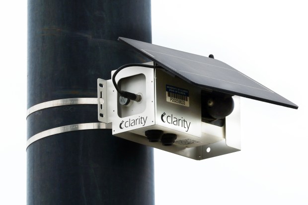 An air quality sensor that is part of the citywide network Open Air Chicago hangs on a pole in Chicago on July 24, 2026. The system is run by the Chicago Department of Public Health and the University of Illinois Chicago. (Terrence Antonio James/Chicago Tribune)