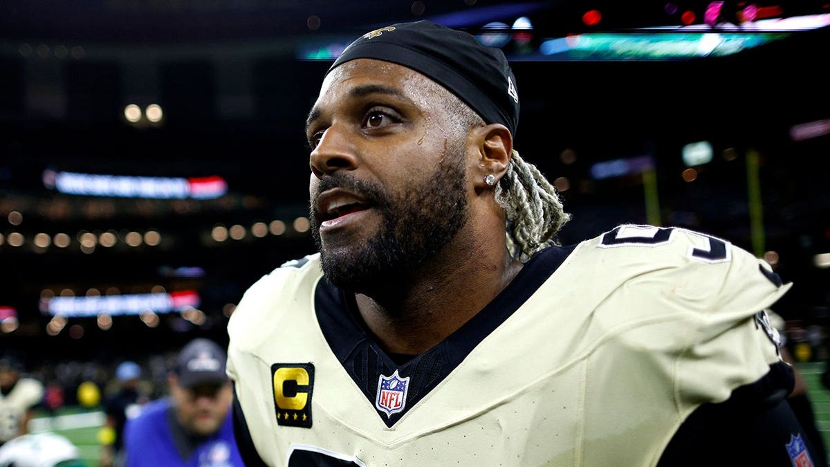 Cam Jordan looks on field