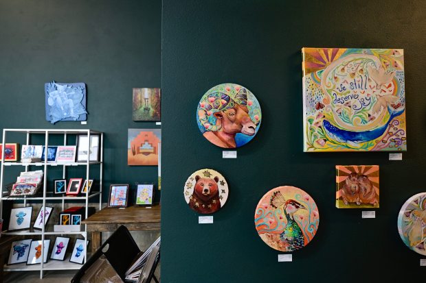 Artwork by artist Kate Fitzpatrick, right, is seen at the "Street Wise Arts" pop-up gallery in the NoBo Artisan Gift Shop on Sept. 4, 2025. First Friday artwalk returns to North Boulder on Friday. (Matthew Jonas/Staff Photographer)