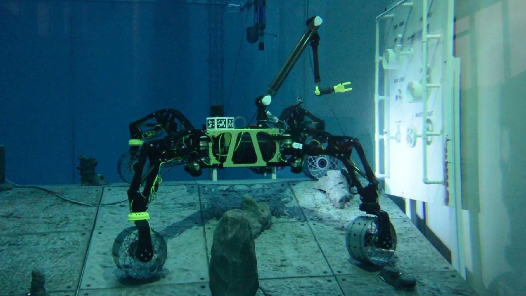 A German six-axis robot arm just welded a steel seam underwater with no diver present, an AI camera finding the joint and a continuous wire feeding the arc — taking over a job that kills at 40 times the rate of the average paycheck, one of the deadliest anyone does