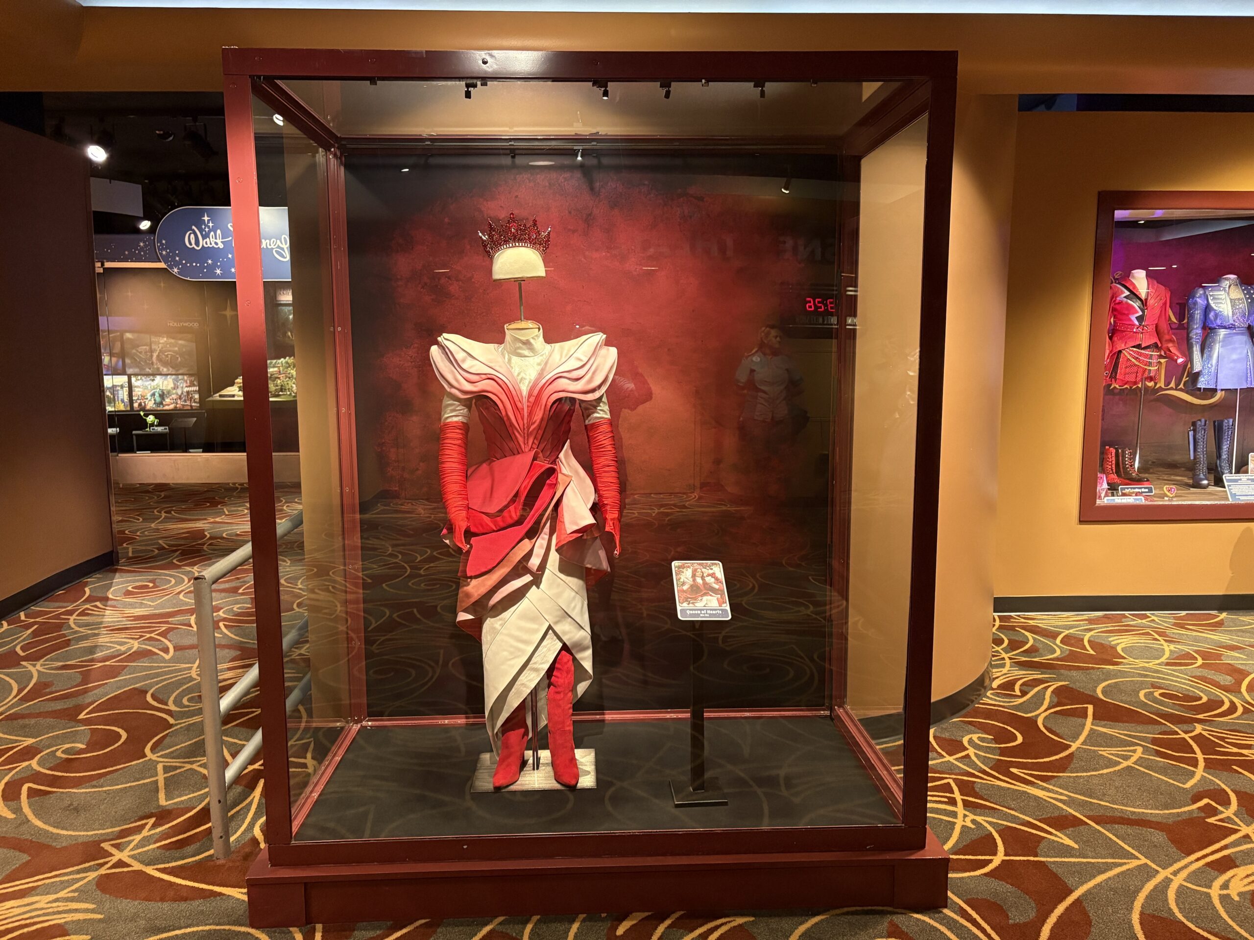 One of the costumes on display is that of Queen of Hearts, played by Rita Ora. It includes her dress, boots, and crown.