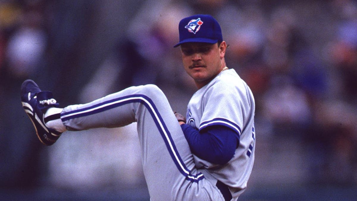 Duane Ward winds up to pitch during a game in Oakland, California.