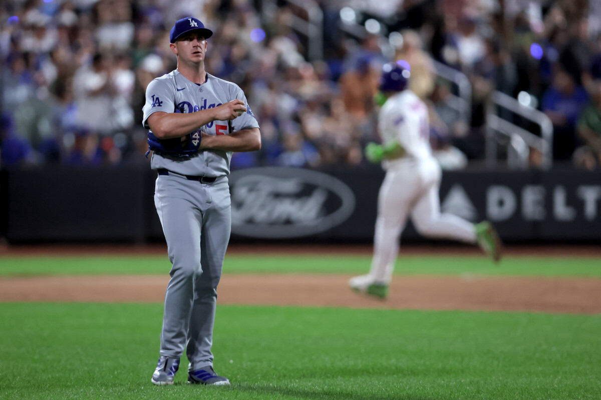 Jul 24, 2026; New York City, New York, USA; Los Angeles Dodgers relief pitcher Evan Phillips (59) reacts after giving up a solo home run to New York Mets catcher Francisco Alvarez (4) during the eighth inning at Citi Field. Mandatory Credit: Brad Penner-Imagn Images