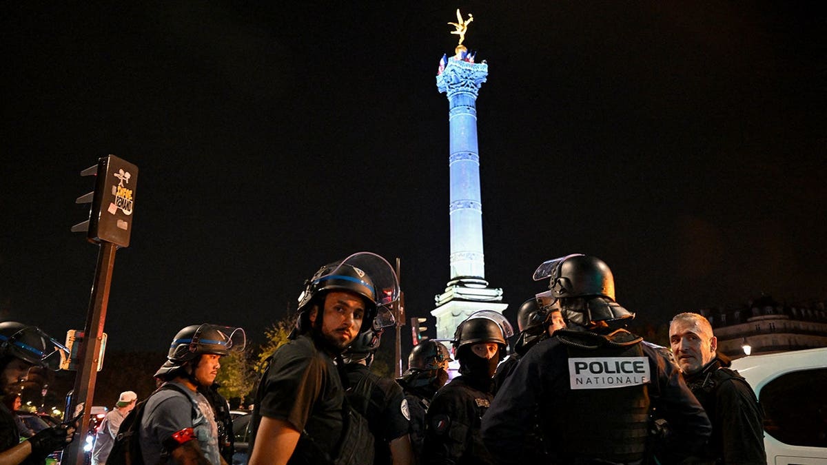 French police officers operate at Place de la Bastille in Paris.