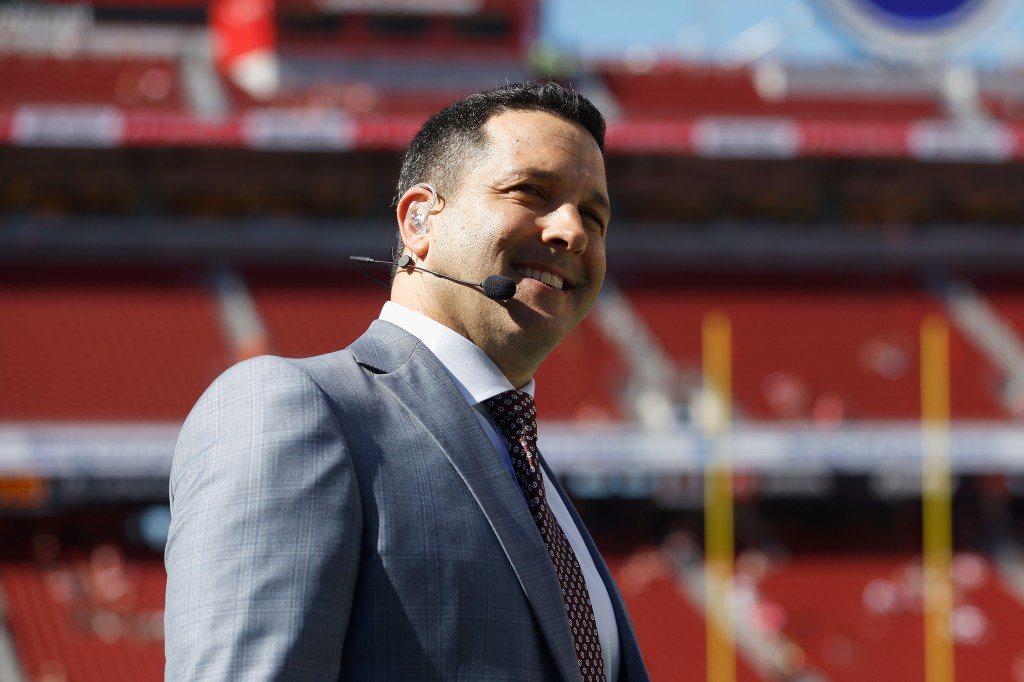 ESPN analyst Adam Schefter looks on before the game between the San Francisco 49ers and the New York Jets at Levi's Stadium on September 09, 2024 in Santa Clara, California. 