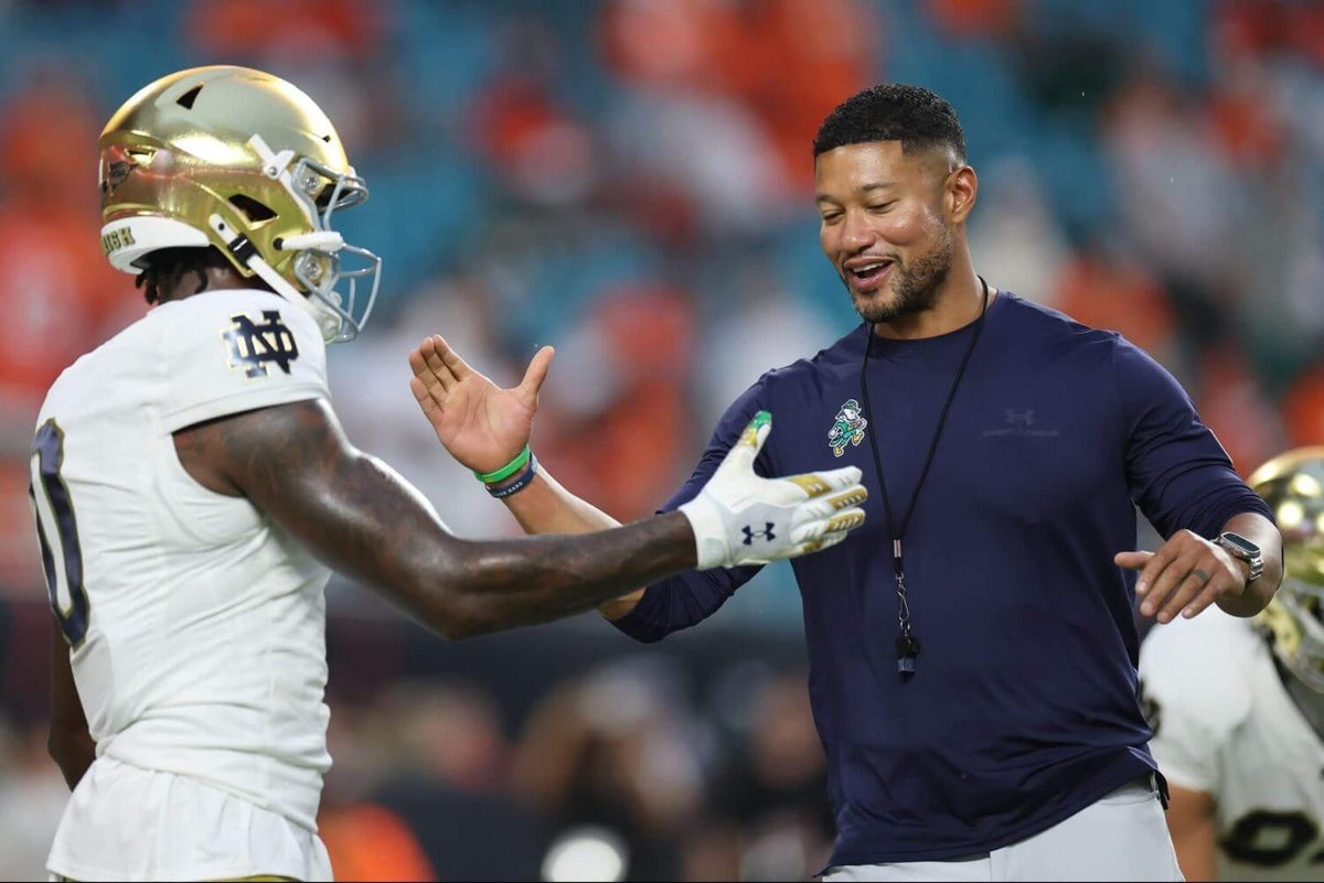 Notre Dame’s Marcus Freeman says he doesn’t see himself ‘coaching anywhere else’ as NFL looks on