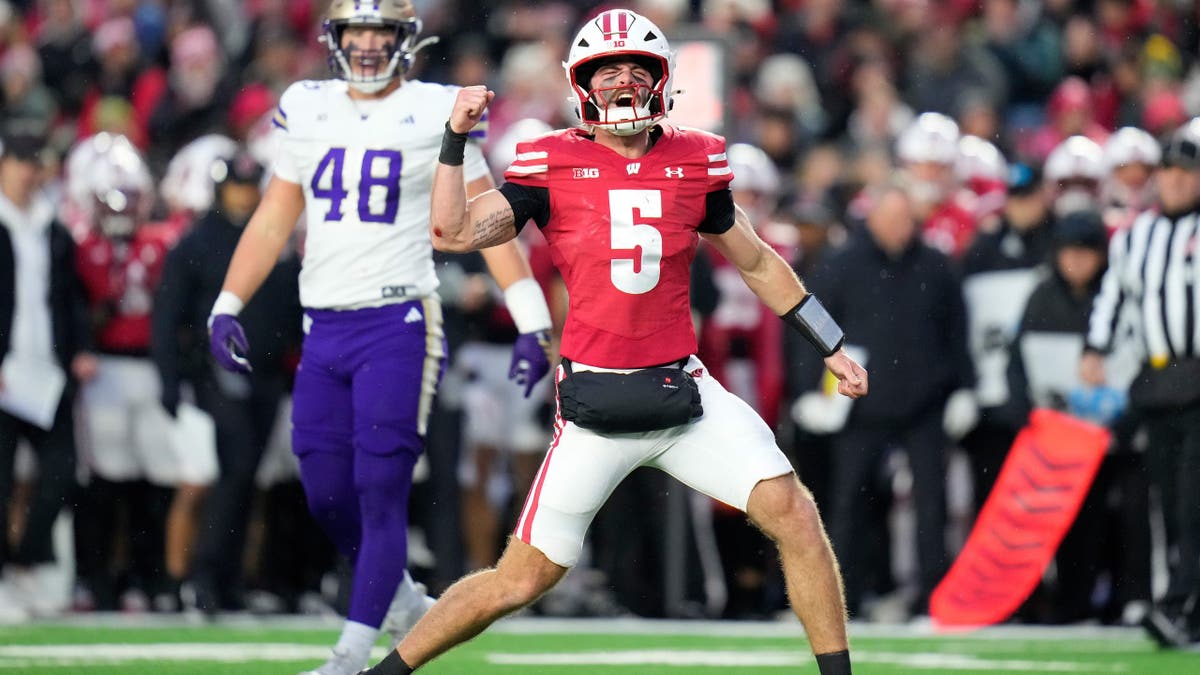 MADISON, WISCONSIN - NOVEMBER 08: Carter Smith #5 of the Wisconsin Badgers reacts after running for a first down in the second quarter against the Washington Huskies at Camp Randall Stadium on November 08, 2025 in Madison, Wisconsin. (Photo by John Fisher/Getty Images)