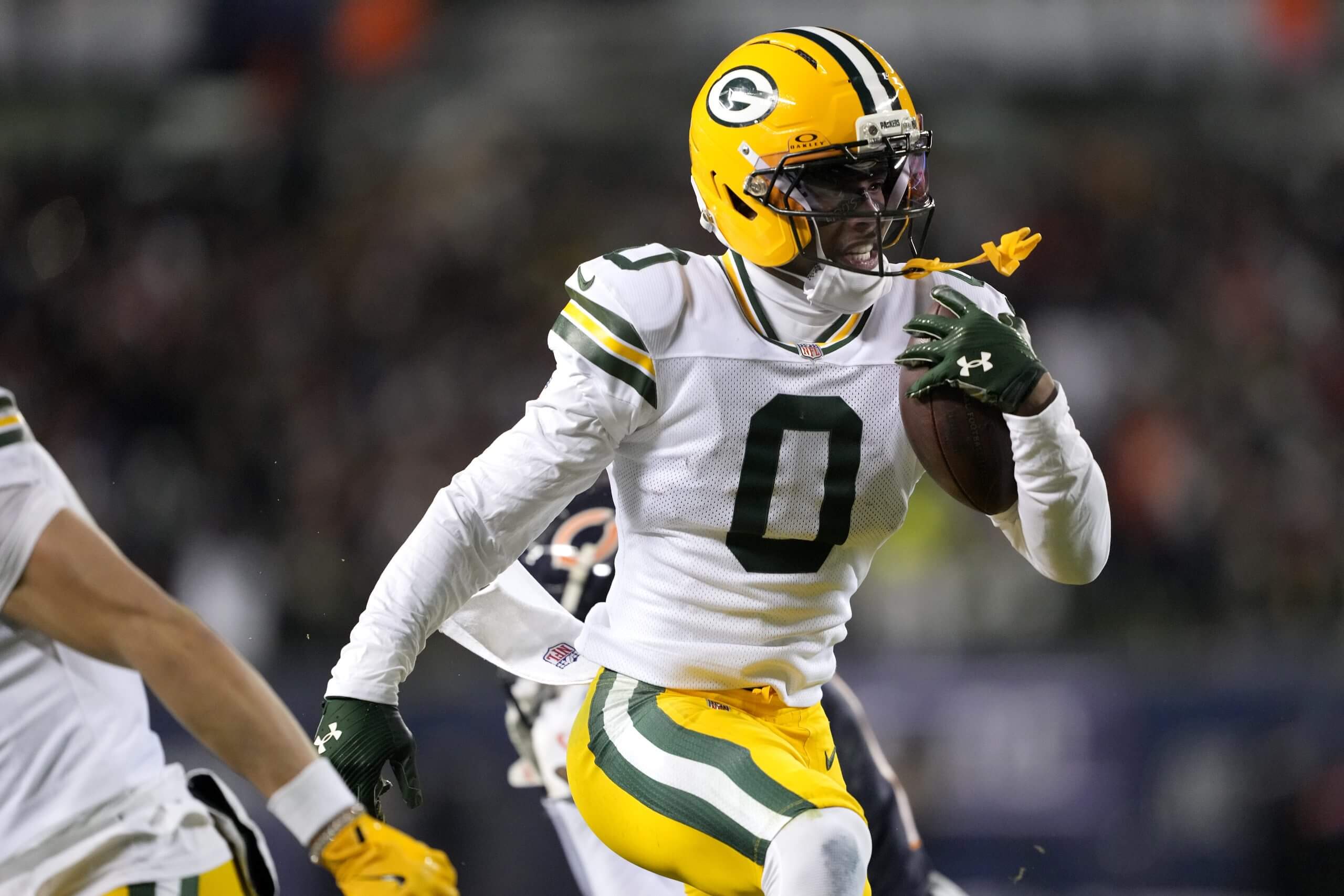 Matthew Golden #0 of the Green Bay Packers scores a touchdown against the Chicago Bears during the fourth quarter in the NFC Wild Card Playoff game at Soldier Field on January 10, 2026 in Chicago, Illinois. 