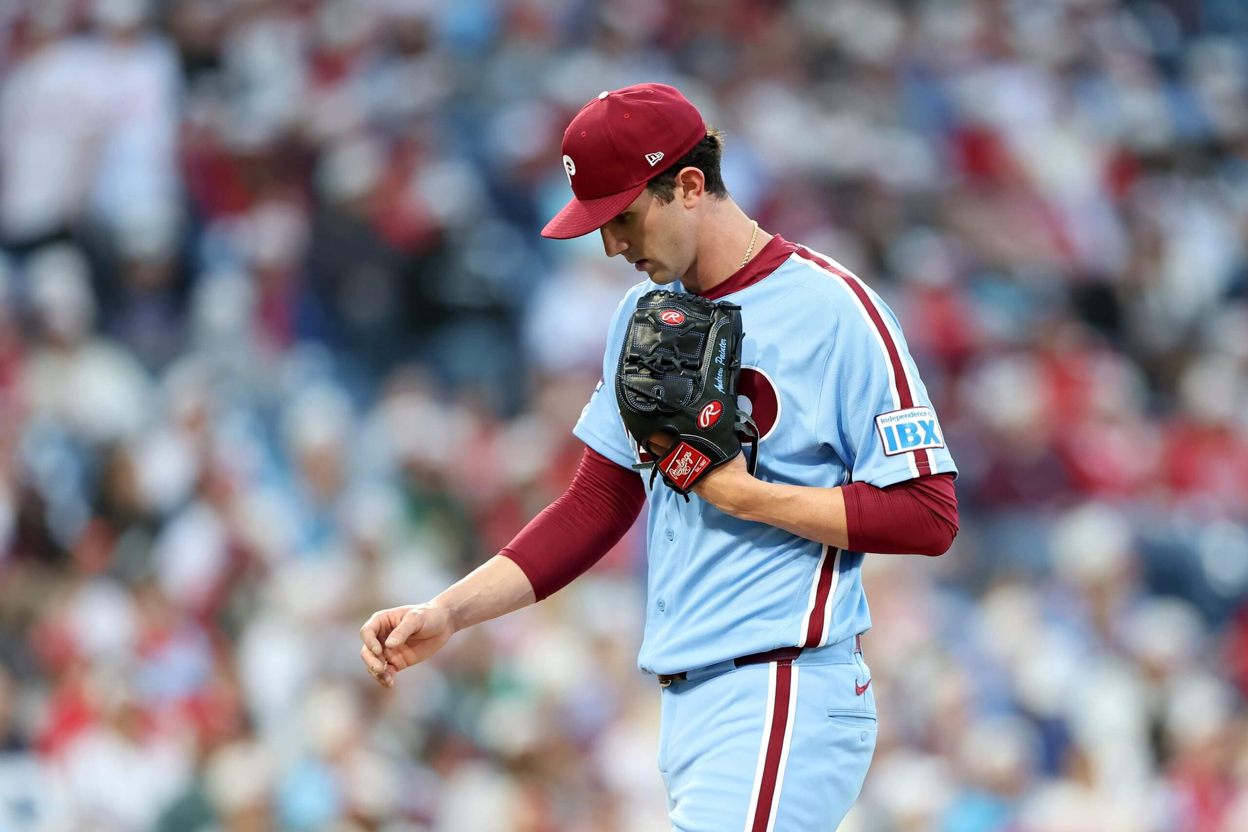 Andrew Painter looks down as he walks off the mound during a pitching change against the Athletics on May 7.
