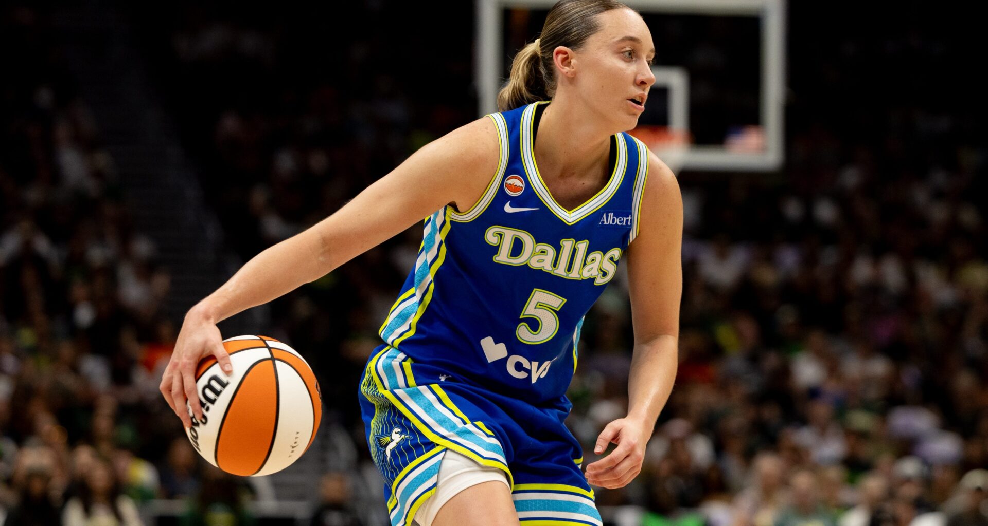 Paige Bueckers of the Dallas Wings dribbles the ball during a game against the Seattle Storm on June 22, 2026, at Climate Pledge Arena in Seattle.