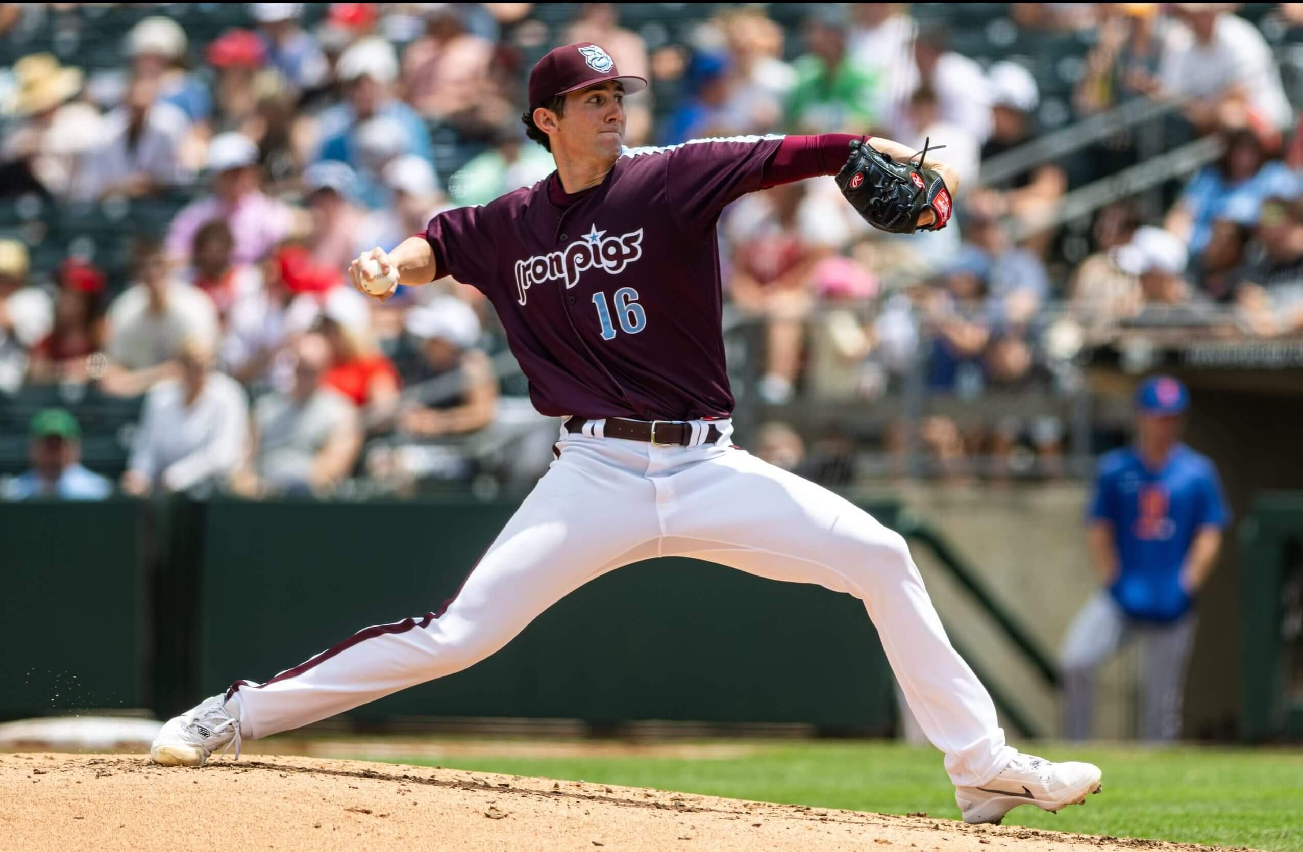 Andrew Painter reaches back to pitch for the Lehigh Valley IronPigs.