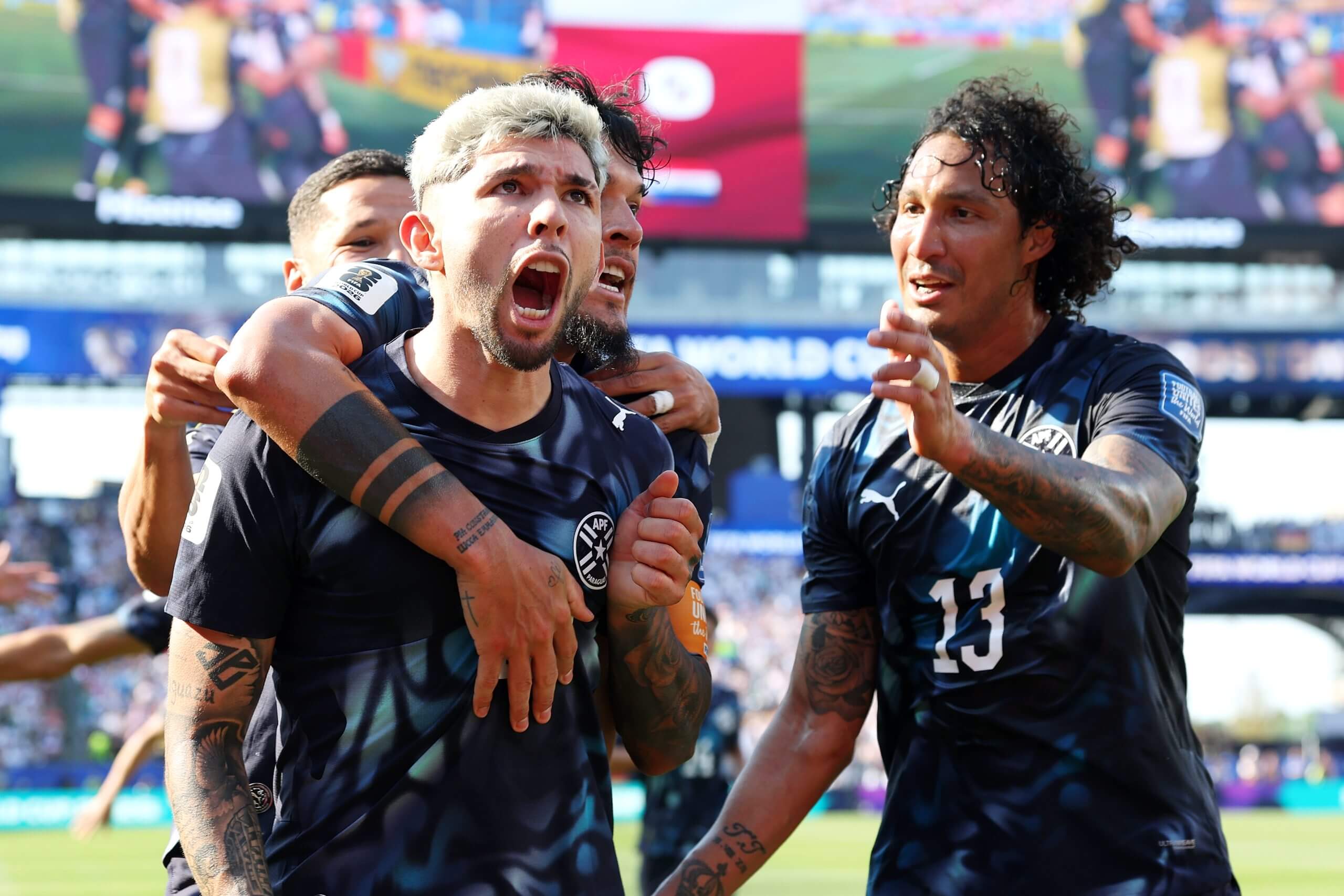 Julio Enciso celebrates scoring against Germany