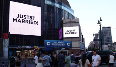 A message on the video screens outside Madison Square Garden announces that Taylor Swift and Travis Kelce are married.