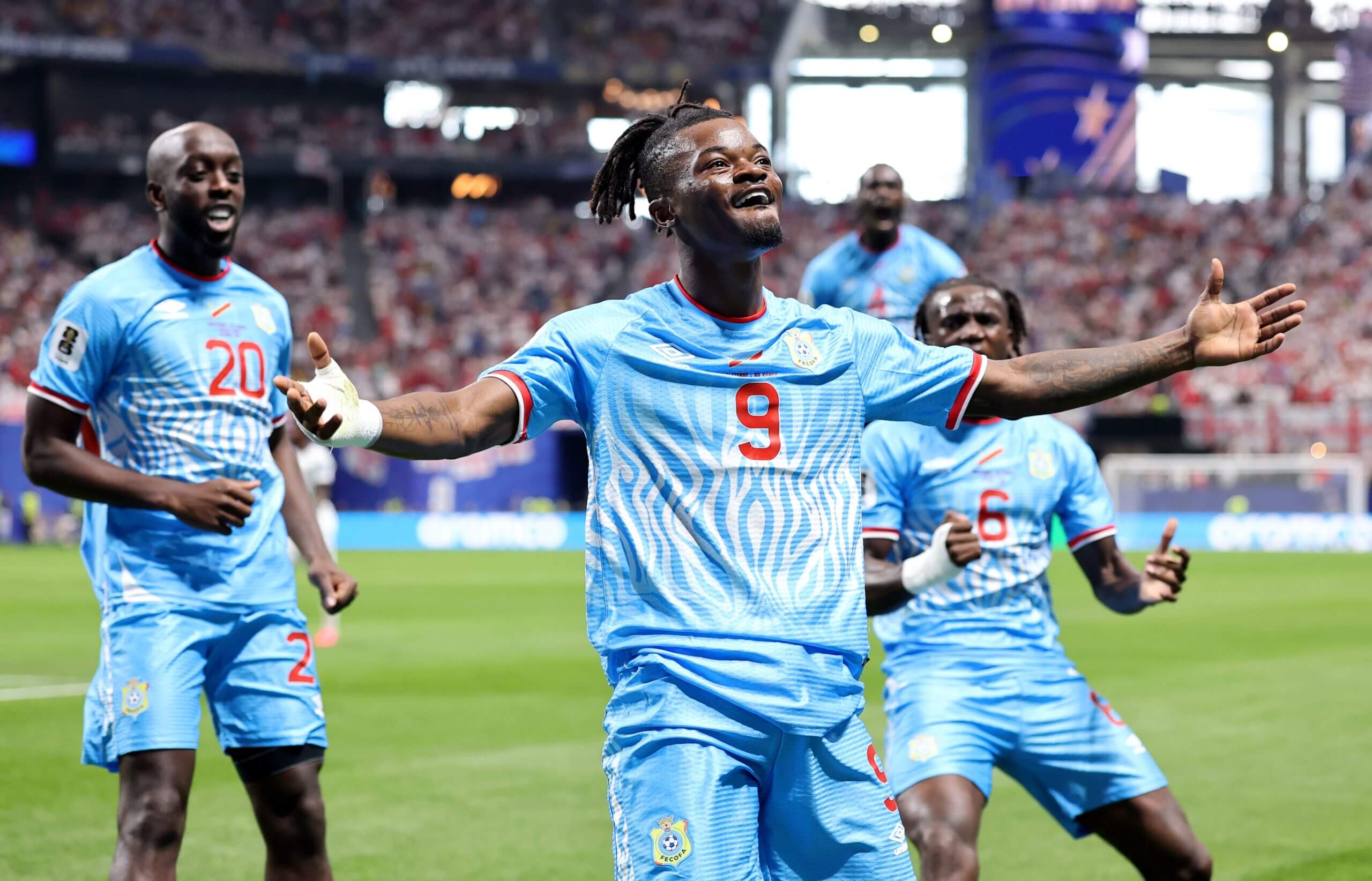 Brian Cipenga celebrates DR Congo's opener against England