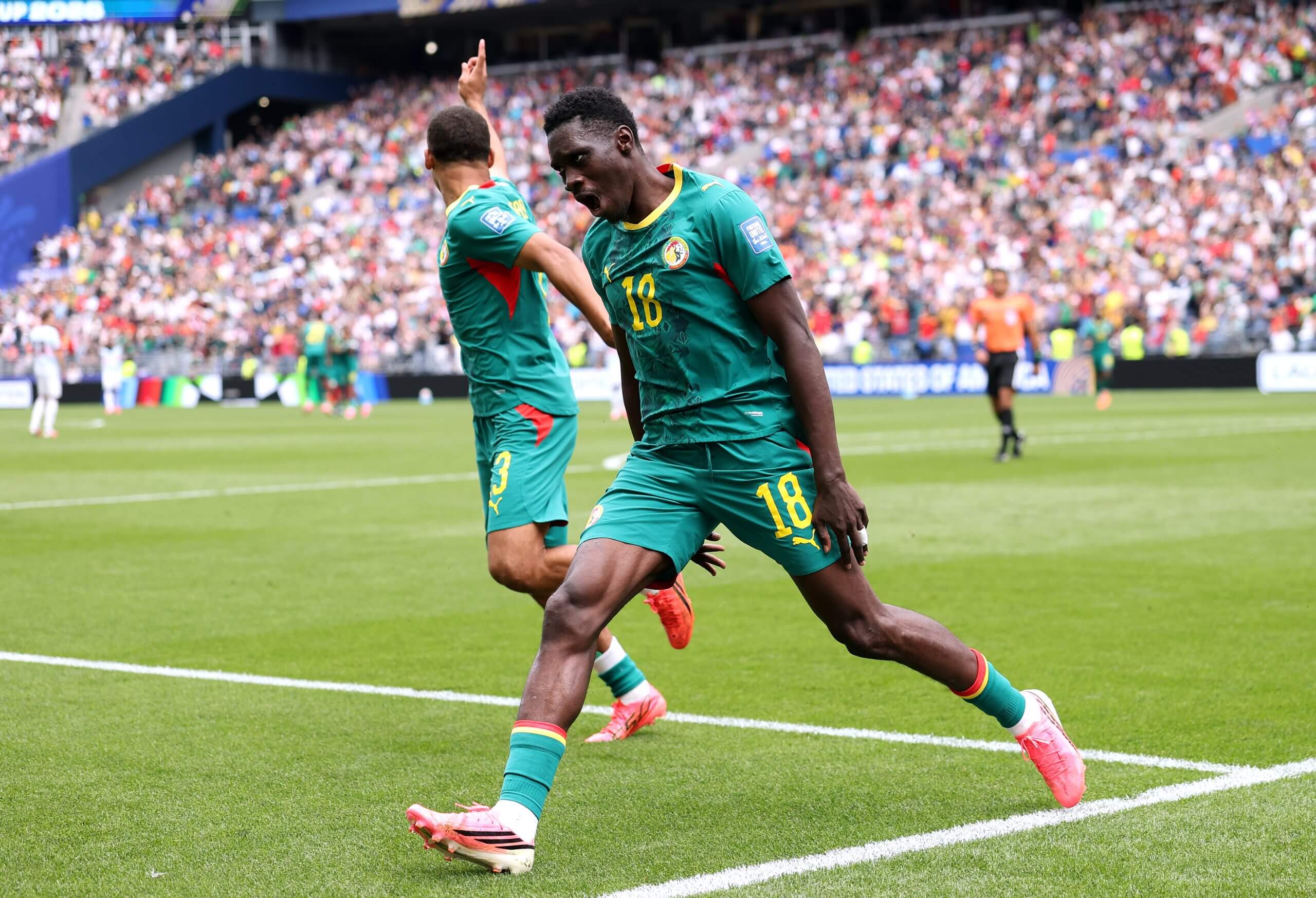 Ismaila Sarr celebrates one of his four tournament goals