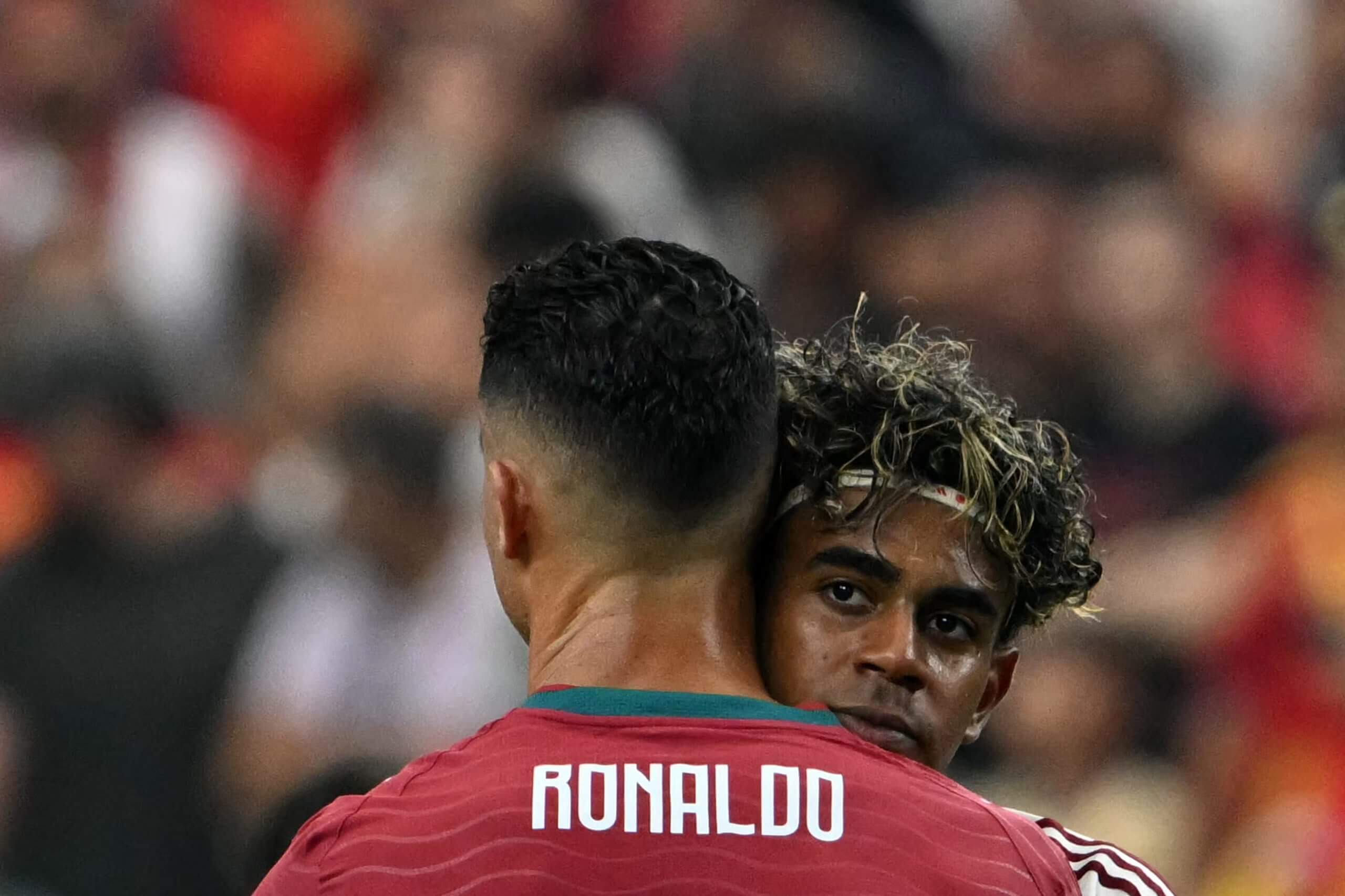 Yamal and Cristiano Ronaldo embrace after Spain's 1-0 win in the last 16