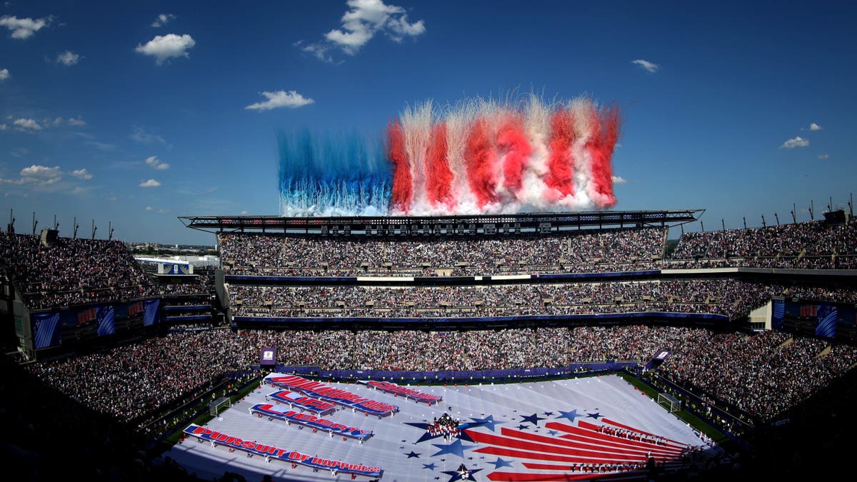 Smoke forming the US national flag during a Fourth of July ceremony before the FIFA World Cup 2026 match in Philadelphia.