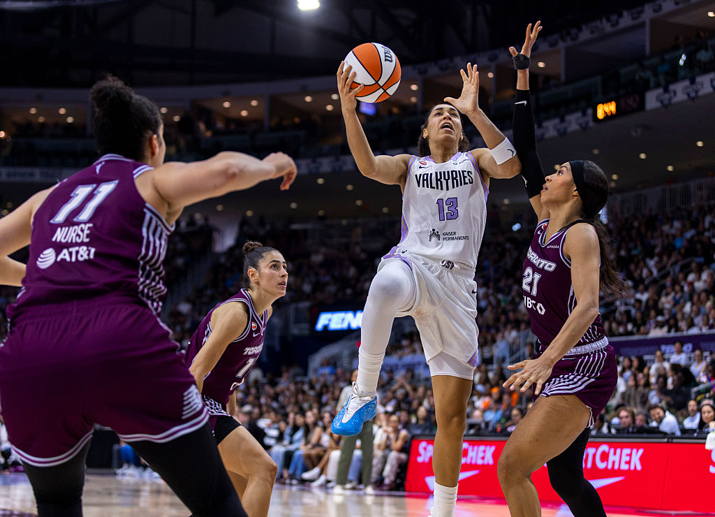 TORONTO, CANADA - JULY 8: Janelle Salaun #13 of the Golden State Valkyries drives to the net while guarded by Isabelle Harrison #21 of the Toronto Tempo during the second half of a WNBA game at Coca-Cola Coliseum on July 8, 2026 in Toronto, Canada. NOTE TO USER: User expressly acknowledges and agrees that, by downloading and or using this photograph, User is consenting to the terms and conditions of the Getty Images License Agreement. (Photo by Tara Walton/Getty Images)