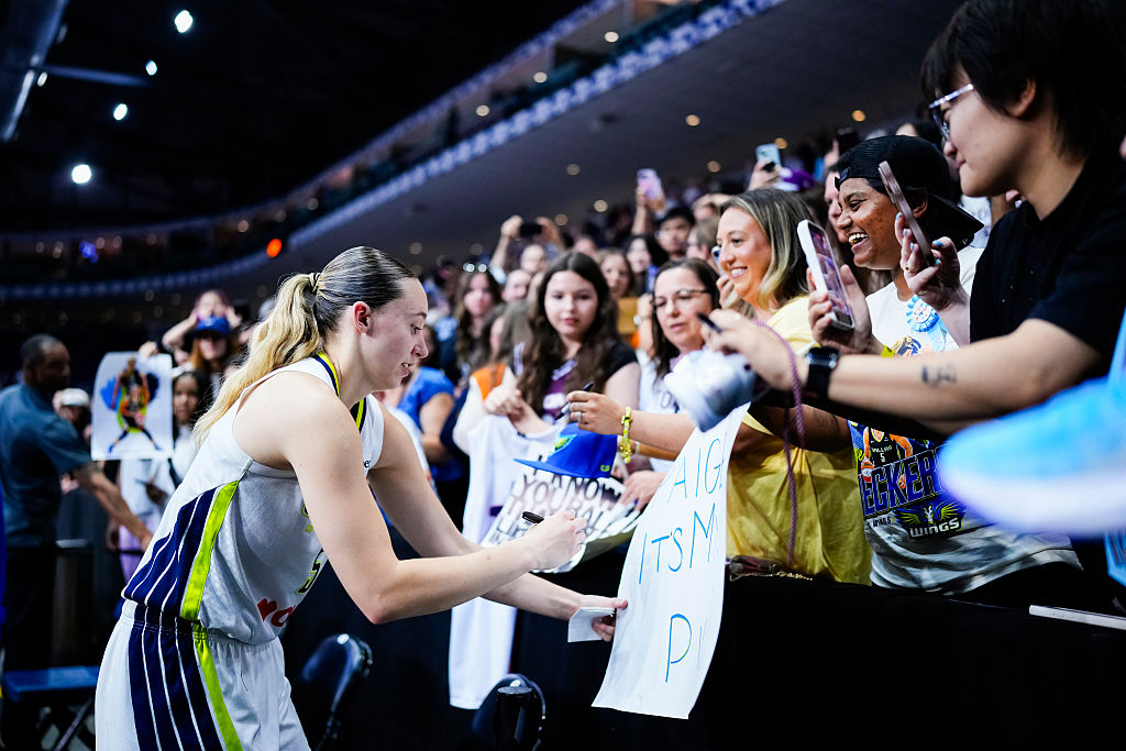 TORONTO, CANADA - JULY 5: Paige Bueckers #5 of the Dallas Wings signsautographs after playing against the Toronto Tempo in their WNBA game at the Coca-Cola Coliseum on July 5, 2026 in Toronto, Canada. (Photo by Mark Blinch/Getty Images) NOTE TO USER: User expressly acknowledges and agrees that, by downloading and/or using this Photograph, user is consenting to the terms and conditions of the Getty Images License Agreement.