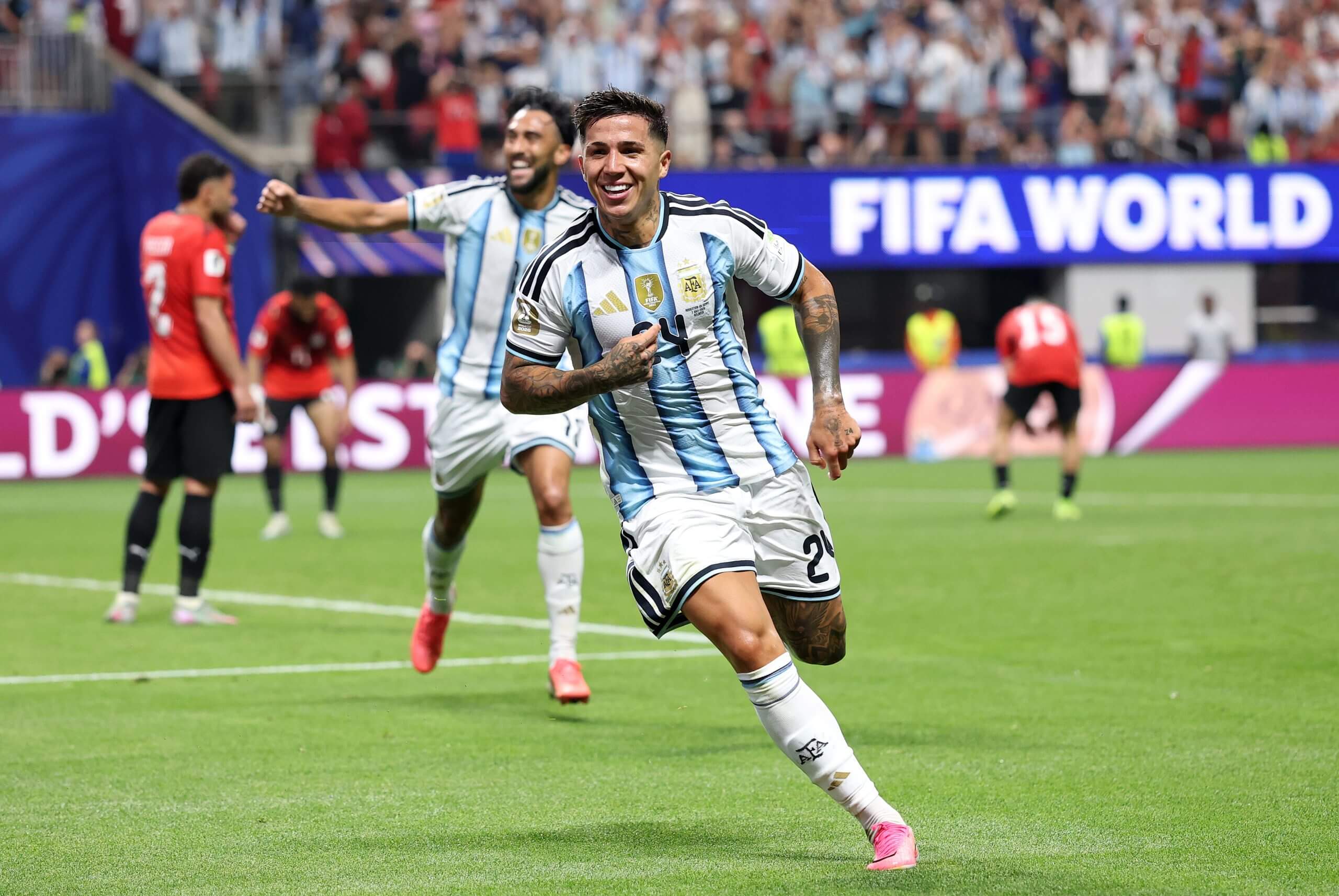 Enzo Fernandez celebrates scoring Argentina's third against Switzerland