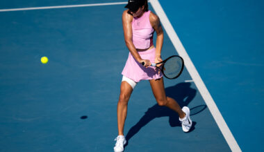 Shadows falling on a tennis stadium