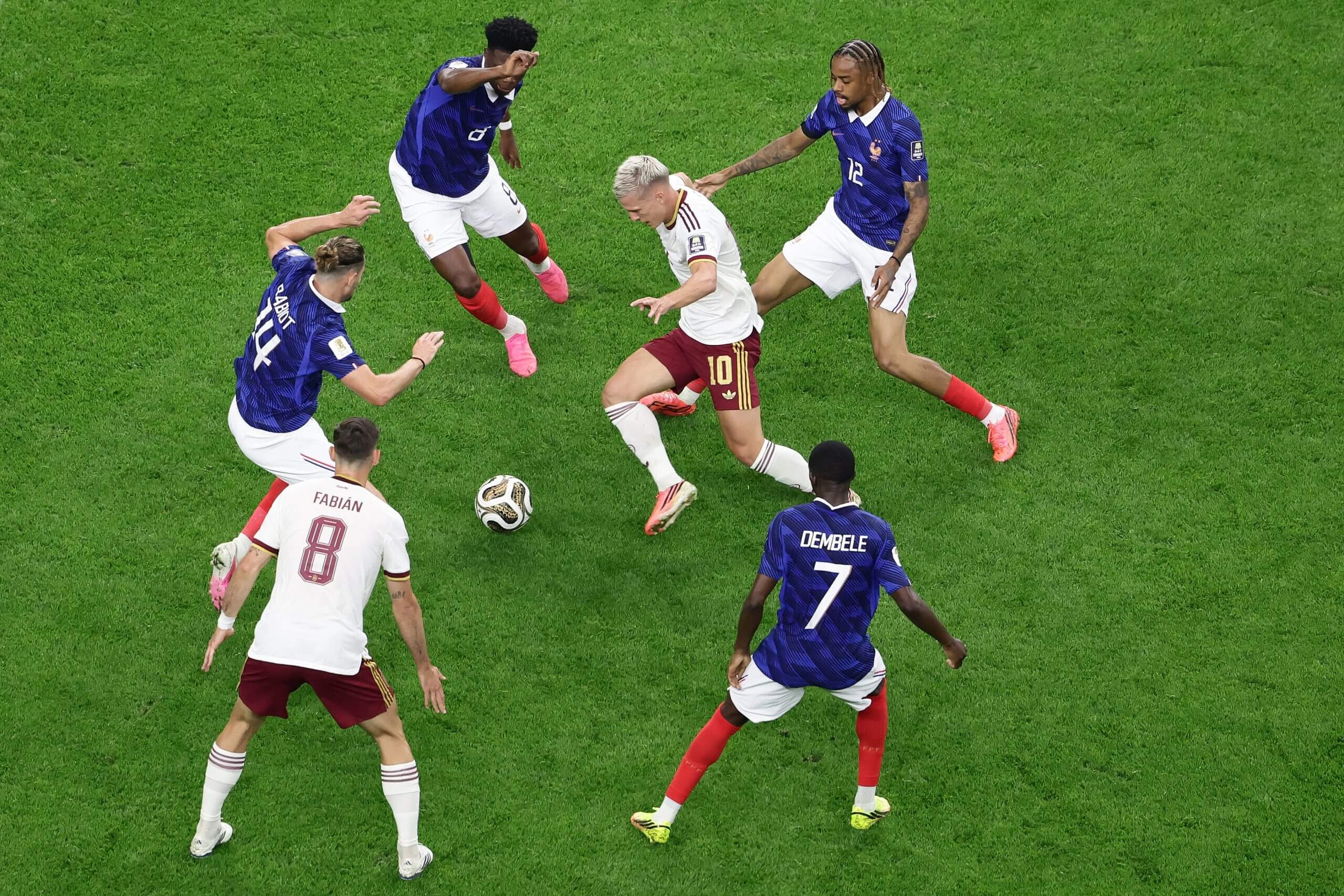 Dani Olmo is closed down by four France players