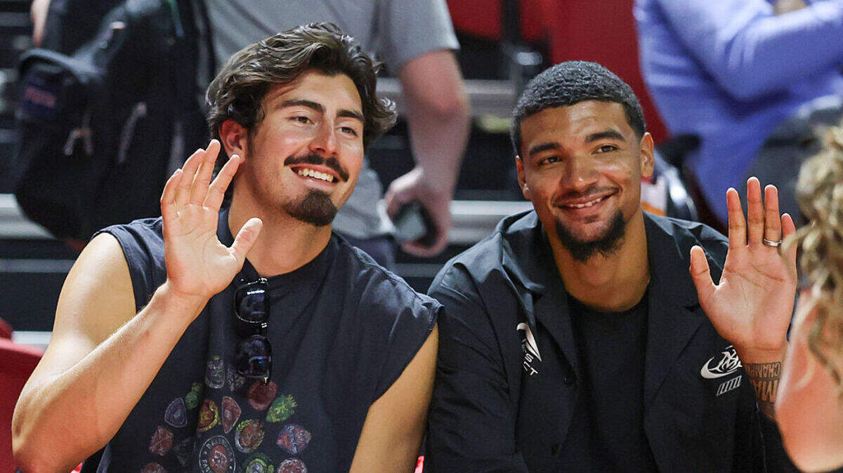 Jaime Jaquez Jr. (L) and Kel'el Ware of the Milwaukee Bucks pose for photos as they sit courtside in the first half of a 2026 NBA Summer League game between the Bucks and the Miami Heat at the Thomas & Mack Center on July 10, 2026 in Las Vegas, Nevada. Jaime Jaquez Jr. (L) and Kel'el Ware of the Milwaukee Bucks pose for photos as they sit courtside in the first half of a 2026 NBA Summer League game between the Bucks and the Miami Heat at the Thomas & Mack Center on July 10, 2026 in Las Vegas, Nevada.