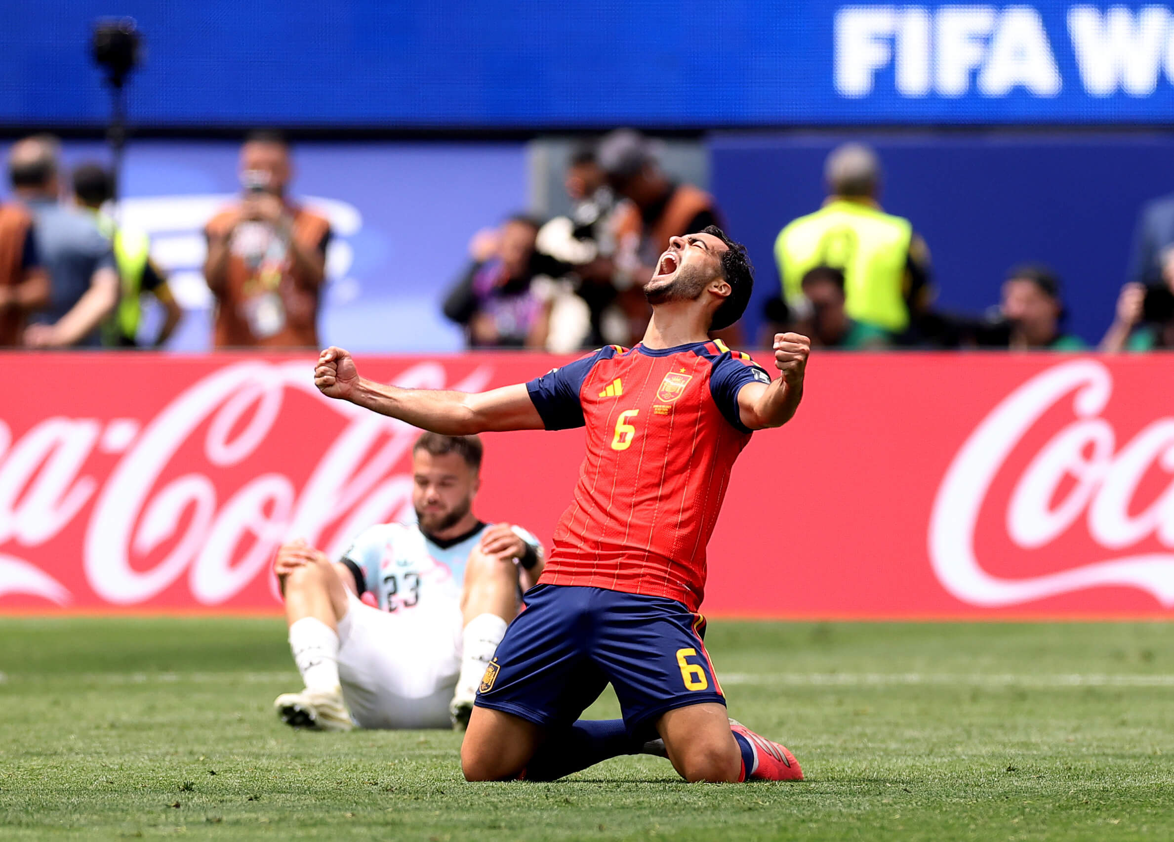 Mikel Merino sinks to his knees to celebrate his winner against Belgium