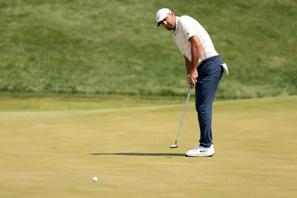 Scottie Scheffler of the United States putts on the ninth green during the first round of the 3M Open 2026 at TPC Twin Cities