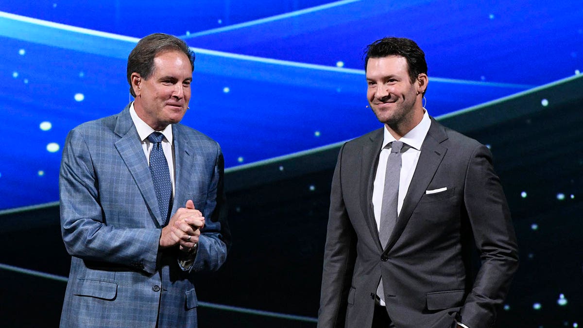 Tony Romo and Jim Nantz on stage