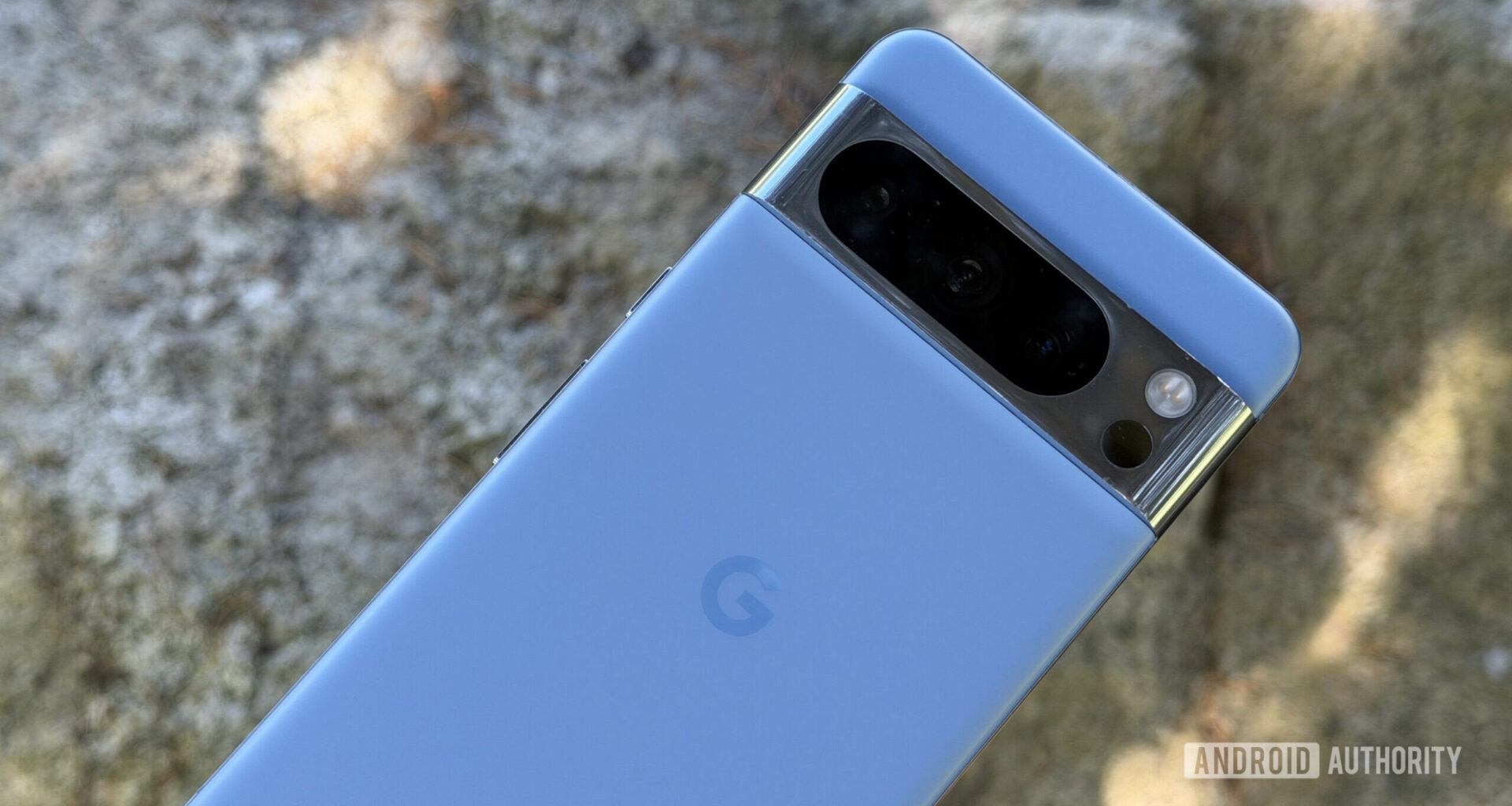Google Pixel 8 Pro on rock