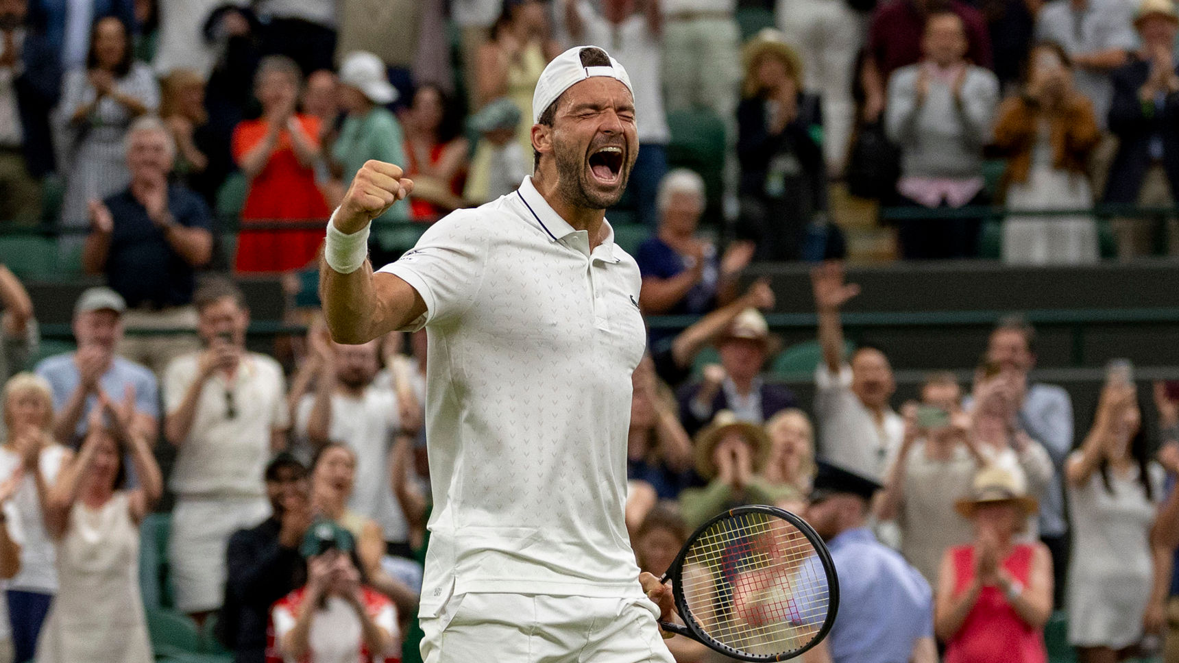 'Emotional' Dimitrov rolls back years with win over Mensik - Wimbledon