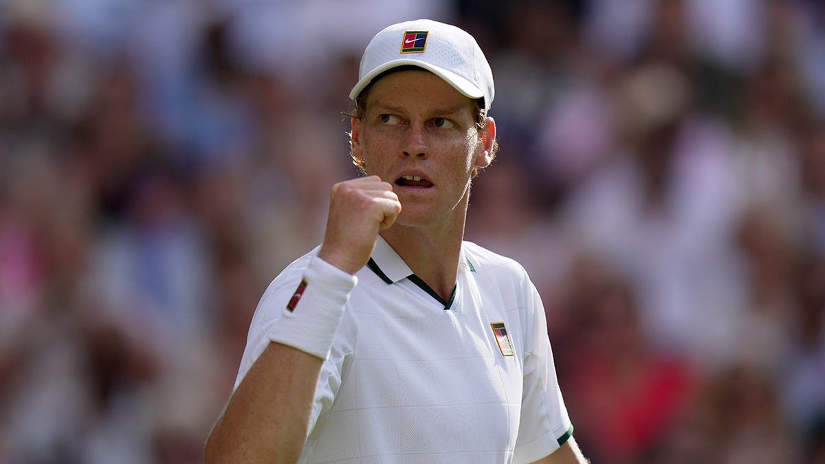 Jannik Sinner celebrates a point during a Wimbledon match in London.