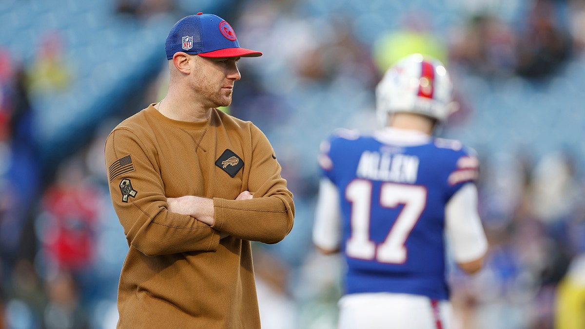 Buffalo Bills coach Joe Brady standing with his arms folded