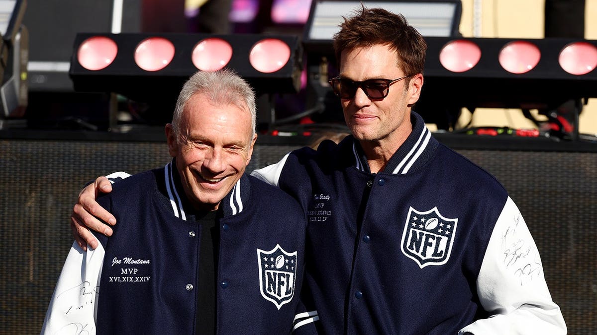 Tom Brady and Joe Montana look on before the game at Levi's Stadium.