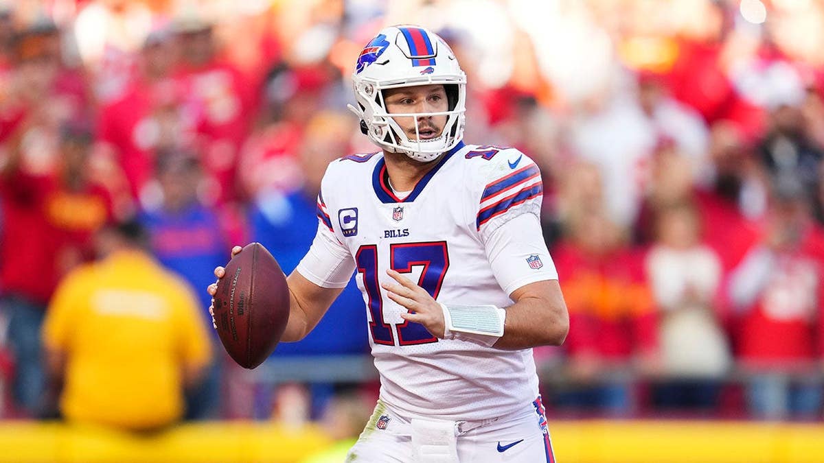 Josh Allen looks to pass during an NFL game