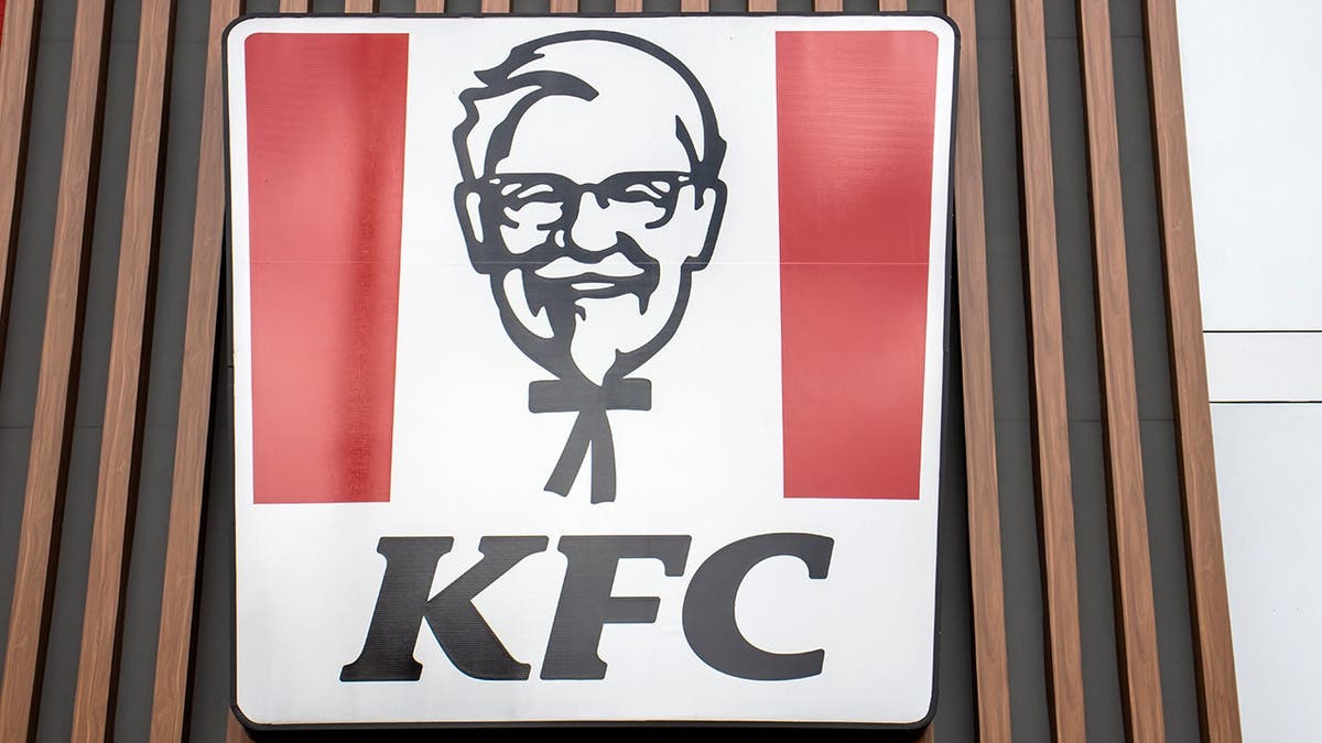The KFC logo on a sign.
