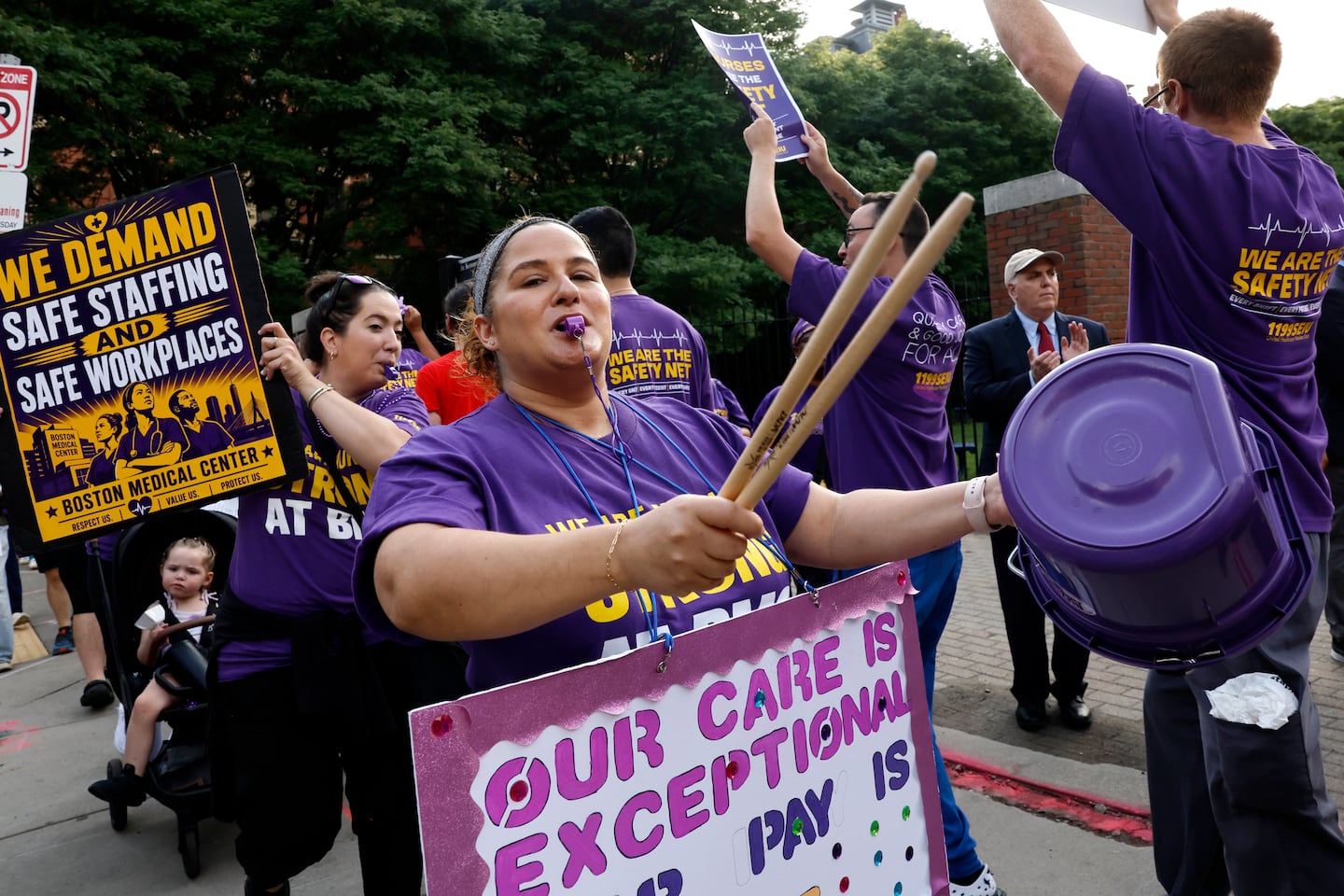 Ally Chase, a nurse at Boston Medical Center, joined picketers outside Boston Medical Center in Boston on Wednesday. Nurses at BMC and BMC-South in Brockton are seeking better pay, working conditions, and benefits.