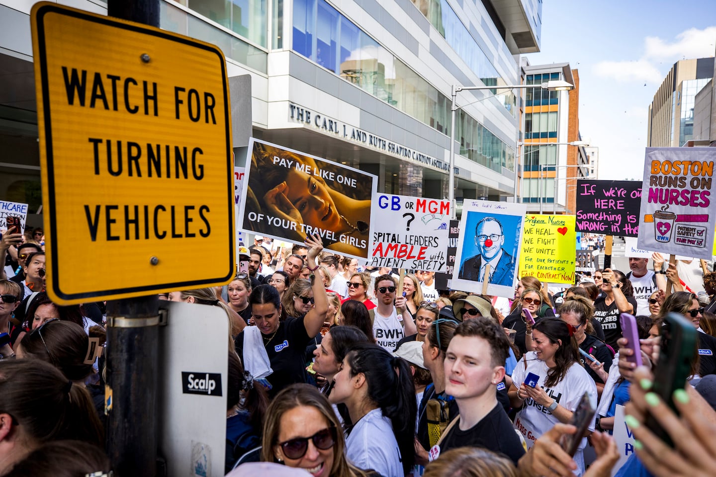 Nurses went on a one-day strike on Wednesday outside Brigham and Women's Hospital. The work stoppage lasted longer because the hospital said it was contractually obligated to provide replacement nurses with five days of work.