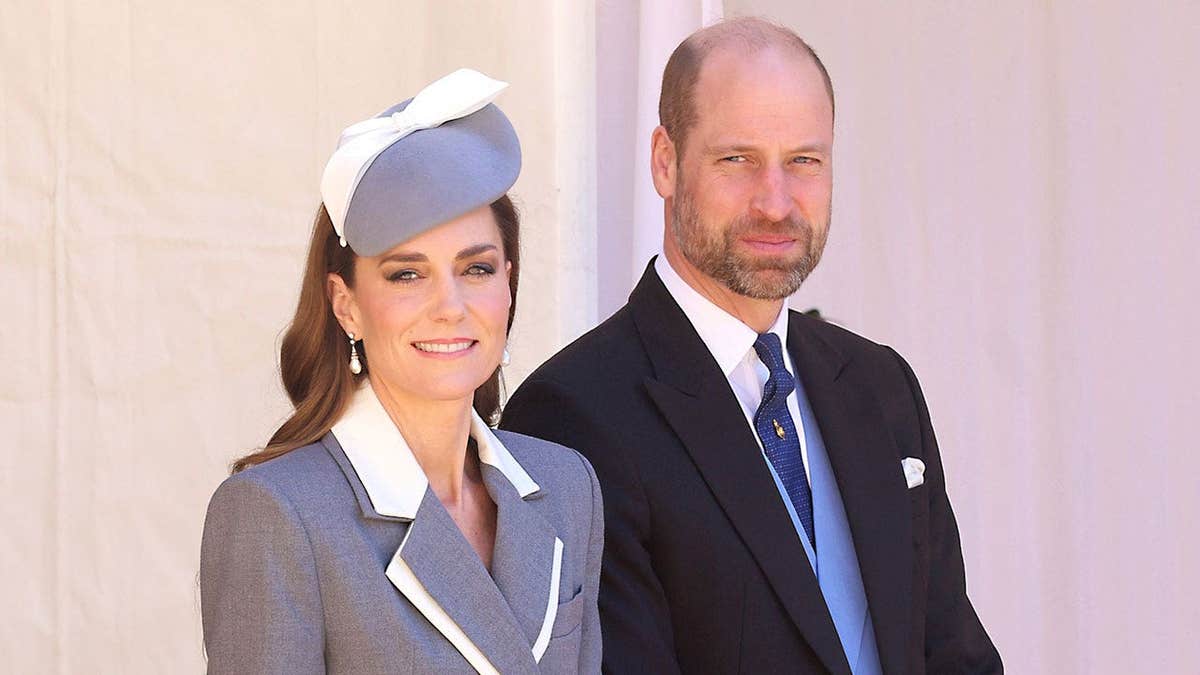 Kate Middleton and Prince William in formal wear standing together during a historic state visit.
