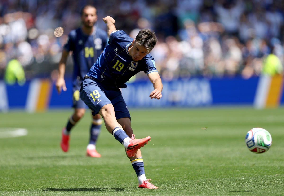 SEATTLE, WASHINGTON - JUNE 24: Kerim Alajbegovic #19 of Bosnia and Herzegovina scores his team's first goal during the FIFA World Cup 2026 Group B match between Bosnia and Herzegovina and Qatar at Seattle Stadium on June 24, 2026 in Seattle, Washington. (Photo by Stu Forster/Getty Images)