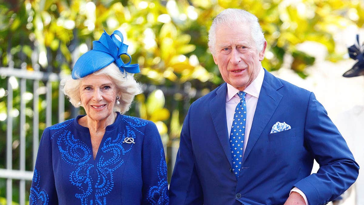 King Charles and Queen Camilla wearing matching cobalt blue ensembles for church.