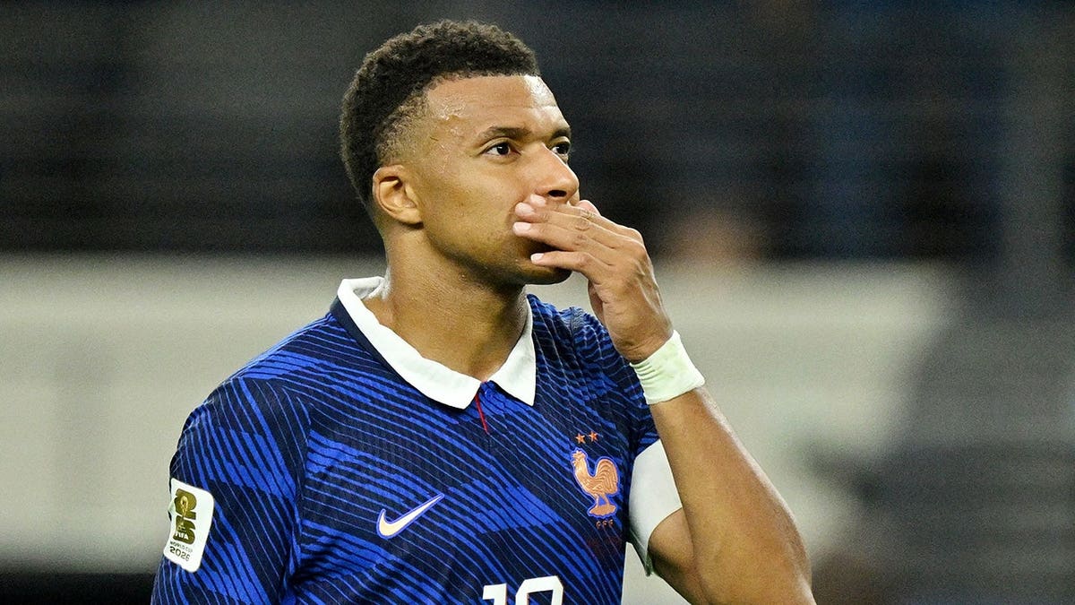 Kylian Mbappe looks dejected after the match in Arlington, Texas.