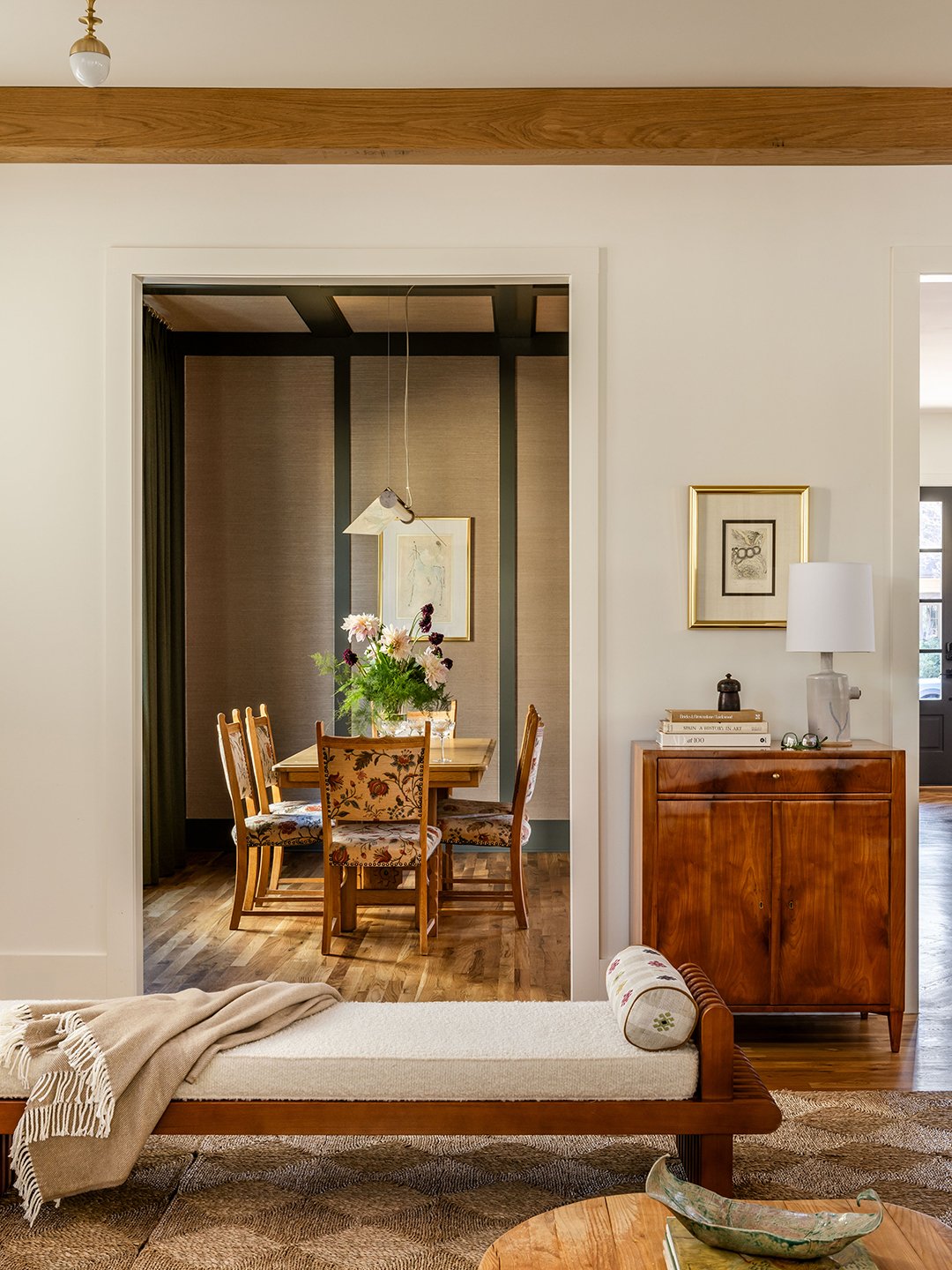 chaise in front of formal dining room