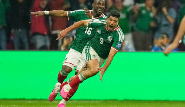 Mexico's Raul Jimenez runs to celebrate on the field.