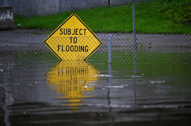 Water inundates the Manzanita park-and-ride lot in Mill Valley, Calif., during a king tide on Friday, Jan. 2, 2026. (Alan Dep/Marin Independent Journal)