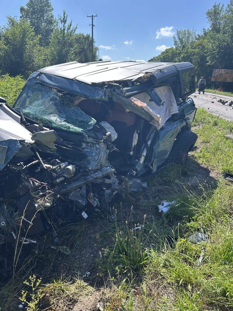 A photo shows the damage to the SUV driven by ESPN's Matt Miller following a highway collision in June.