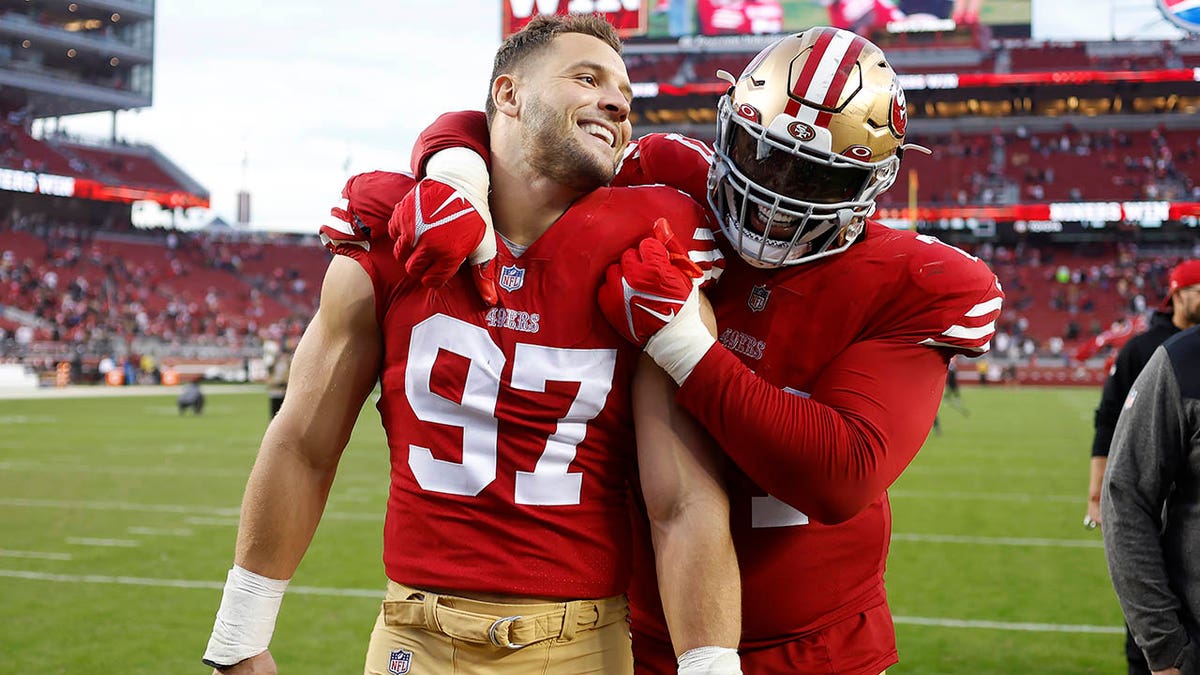 Nick Bosa walks off the field