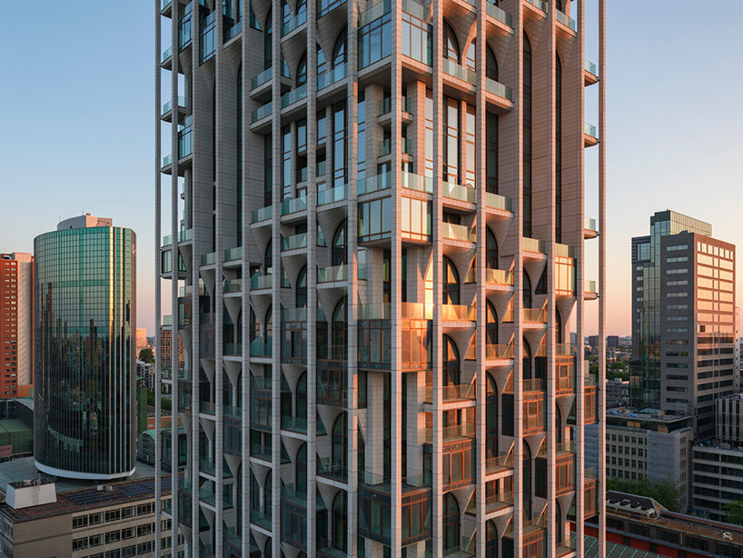 grid of arches wraps ODA’s newly completed POST tower in rotterdam - 1