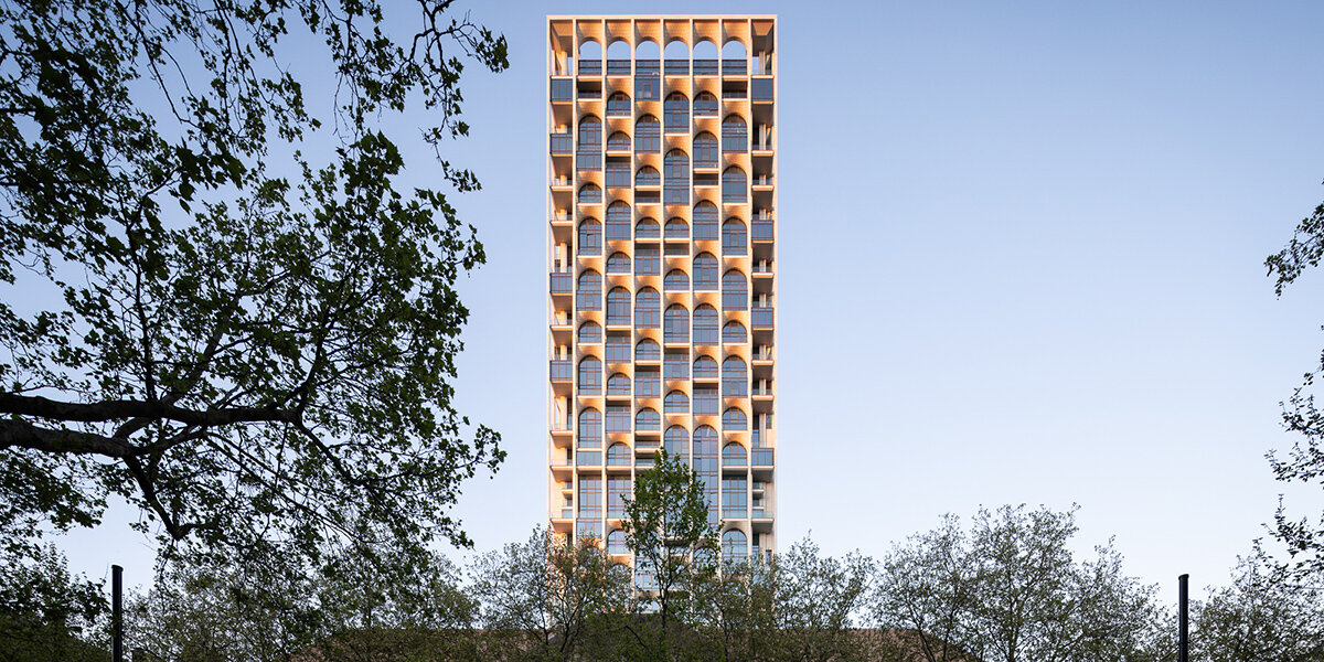 grid of arches wraps ODA’s newly completed POST tower in rotterdam